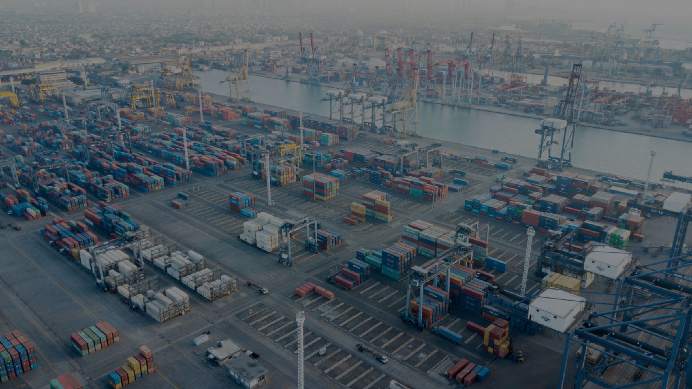 Aerial view of a container port at dusk